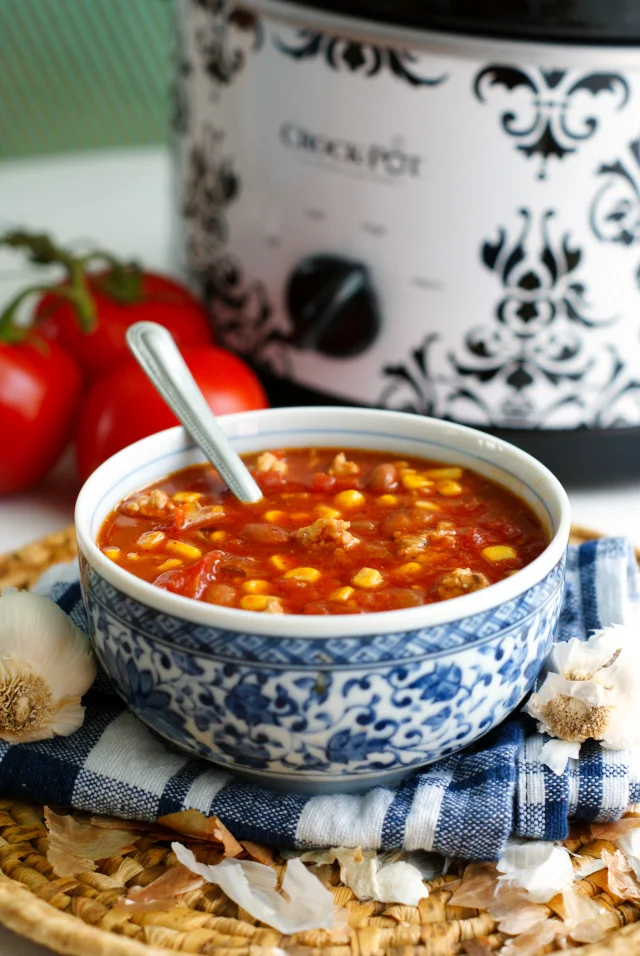 Easy Crock Pot Chicken Chili takes just a few minutes of prep then a few hours in the crock pot to make an easy and delicious dinner the whole family will love!