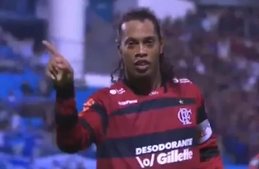 Ronaldinho celebrates after scoring straight from the corner against Avaí