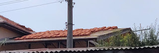 Tiles all stacked on the roof
