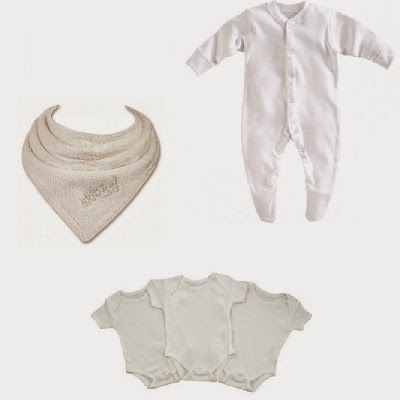 White baby vests, white newborn sleepsuits and organic Skibz bibs