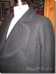 Diagonal basting along lapel.