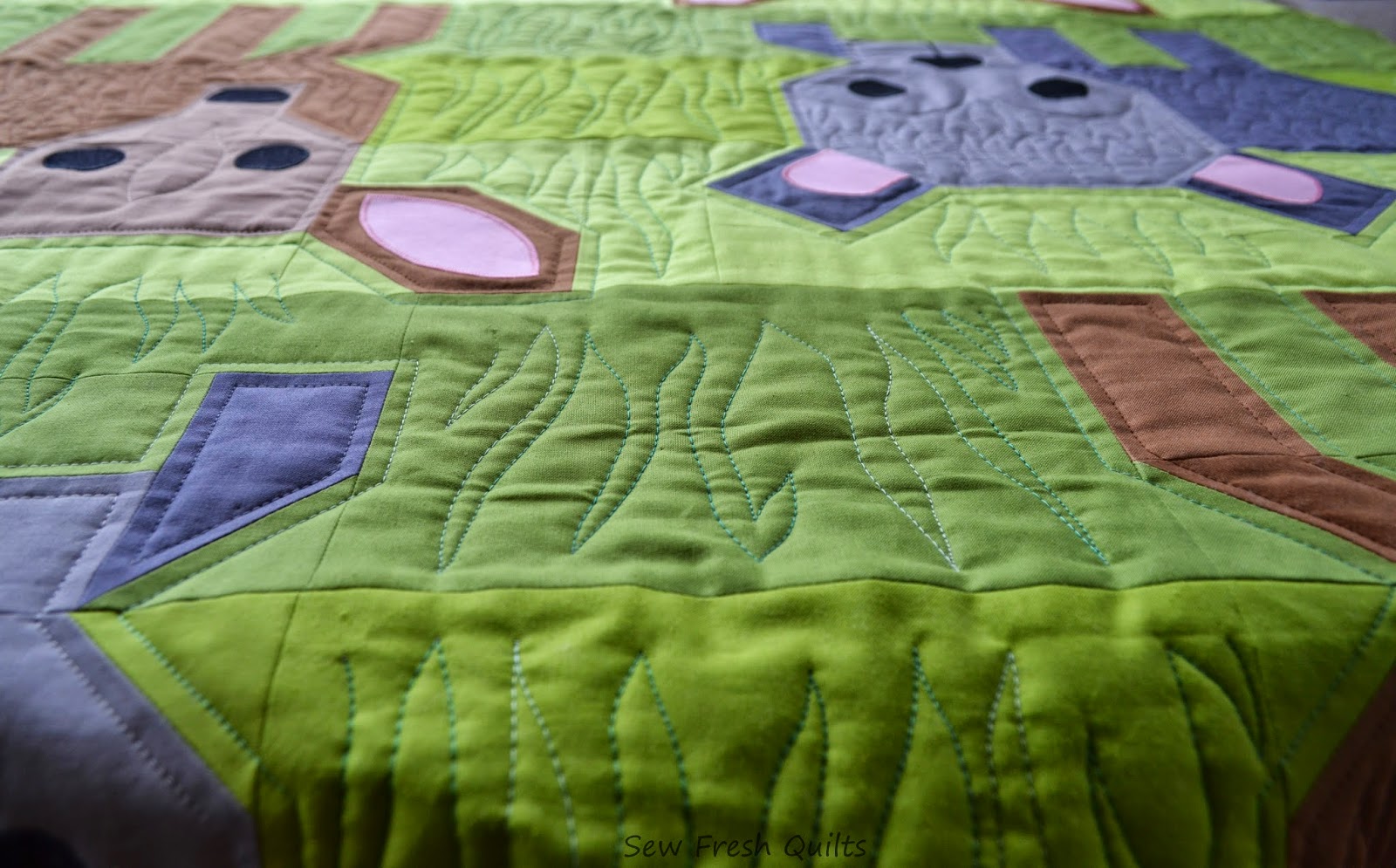 http://sewfreshquilts.blogspot.ca/2014/10/wild-life-finished-top.html