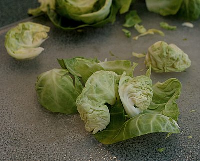 Four Ways to Cut Up Brussels Sprouts, depending on how you'll use them ♥ AVeggieVenture.com. Step-by-step photos.