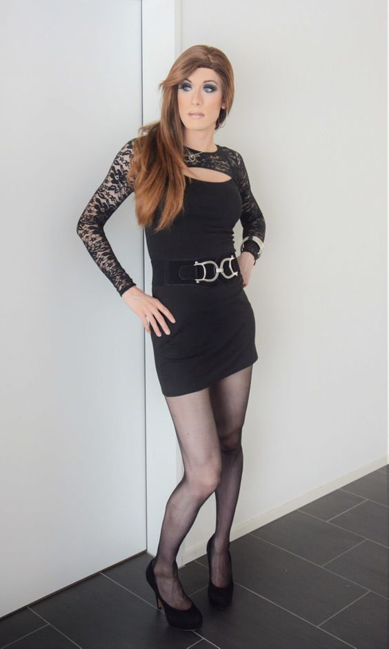 Sexy crossdresser in black pantyhose