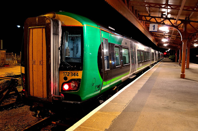 Night photo of London Midlands Trains DMU class 172344 Turbostar diesel multiple unit at leamington spa station England 2016.