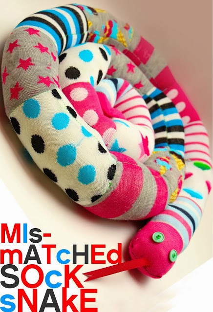 http://grosgrainfabulous.blogspot.com/2013/05/mismatched-socks-sew-sock-snake.html