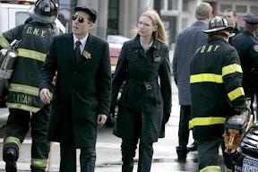 FRINGE: Olivia (Anna Torv, R) and Charlie (Kirk Acevedo, L) arrive at a crime scene in the FRINGE season finale episode 'There's More Than One of Everything' airing Tuesday, May 12 (9:01-10:00 PM ET/PT) on FOX. ©2009 Fox Broadcasting Co. CR: Craig Blankenhorn/FOX