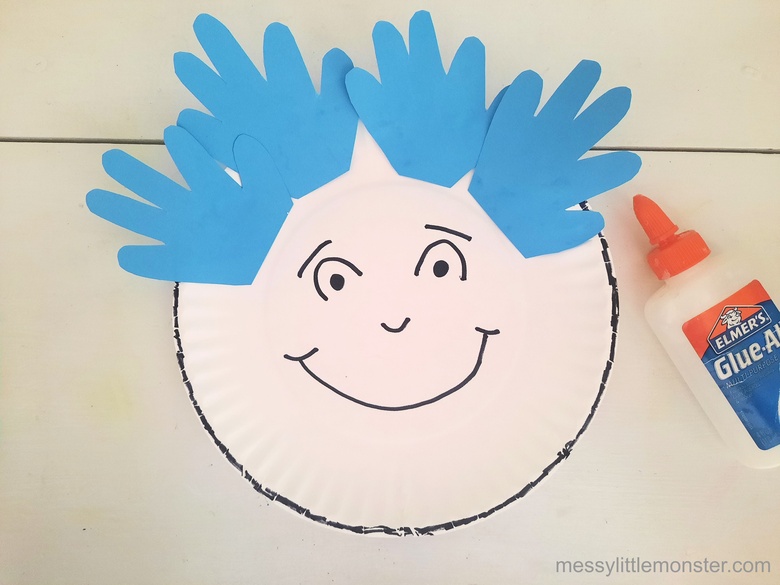 Add handprints to Thing1 and Thing 2 paper plate craft