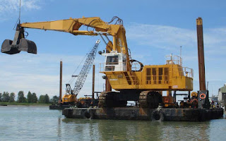 JASA EKSPEDISI PENGANGKUTAN DAN PENGIRIMAN CARGO ALAT BERAT EXCAVATOR CLAMSHELL SURABAYA PADANG MURAH