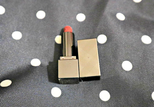 Burberry Lipstick on a polka dot background