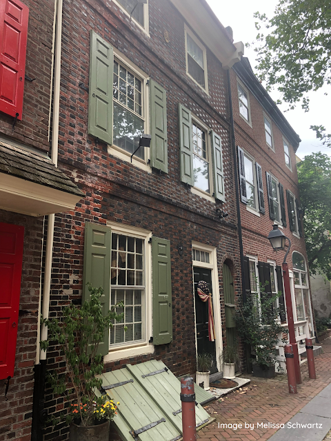 Elfreth's Alley in Philadelphia displays early American architecture  in the form of row houses.