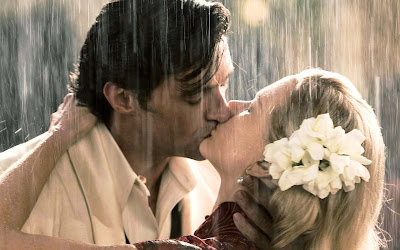 Kissing-couple-in-rain-marvelouswallpapers