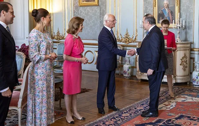 Crown Princess Victoria wore a new printed side slit maxi dress by Other Stories. Queen Silvia wore a fuchsia dress