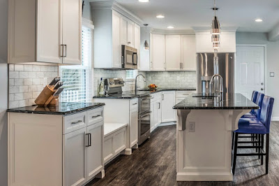 kitchen island with granite top and sink