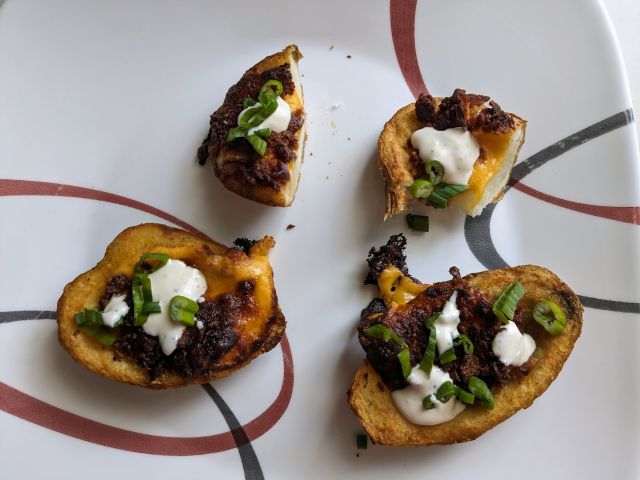 Kroger Loaded Potato Skins with ranch and green onions added.