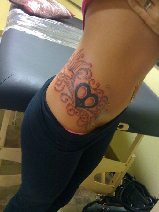 hip tattoos. cute hip tattoos. acecupid