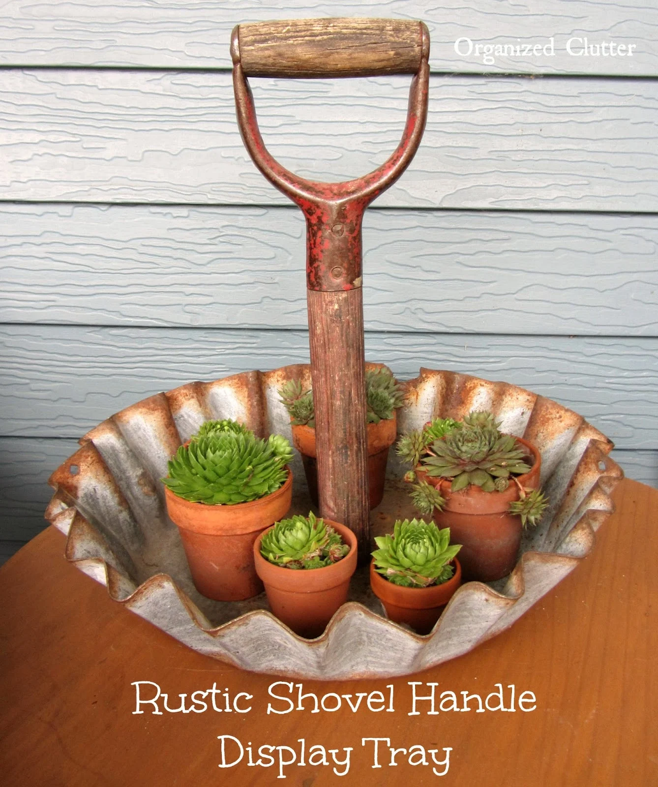 Shovel Handle Display Tray www.organizedclutterqueen.blogspot.com