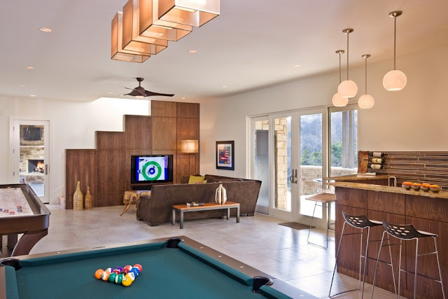 Photo of entertainment room with pool table and private bar