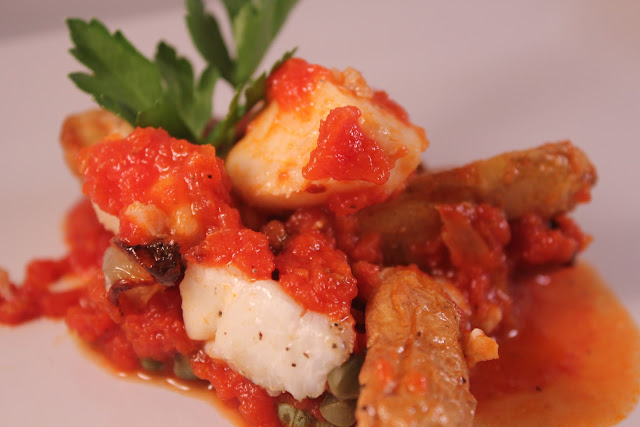 Haddock and fingerling potatoes in tomato sauce