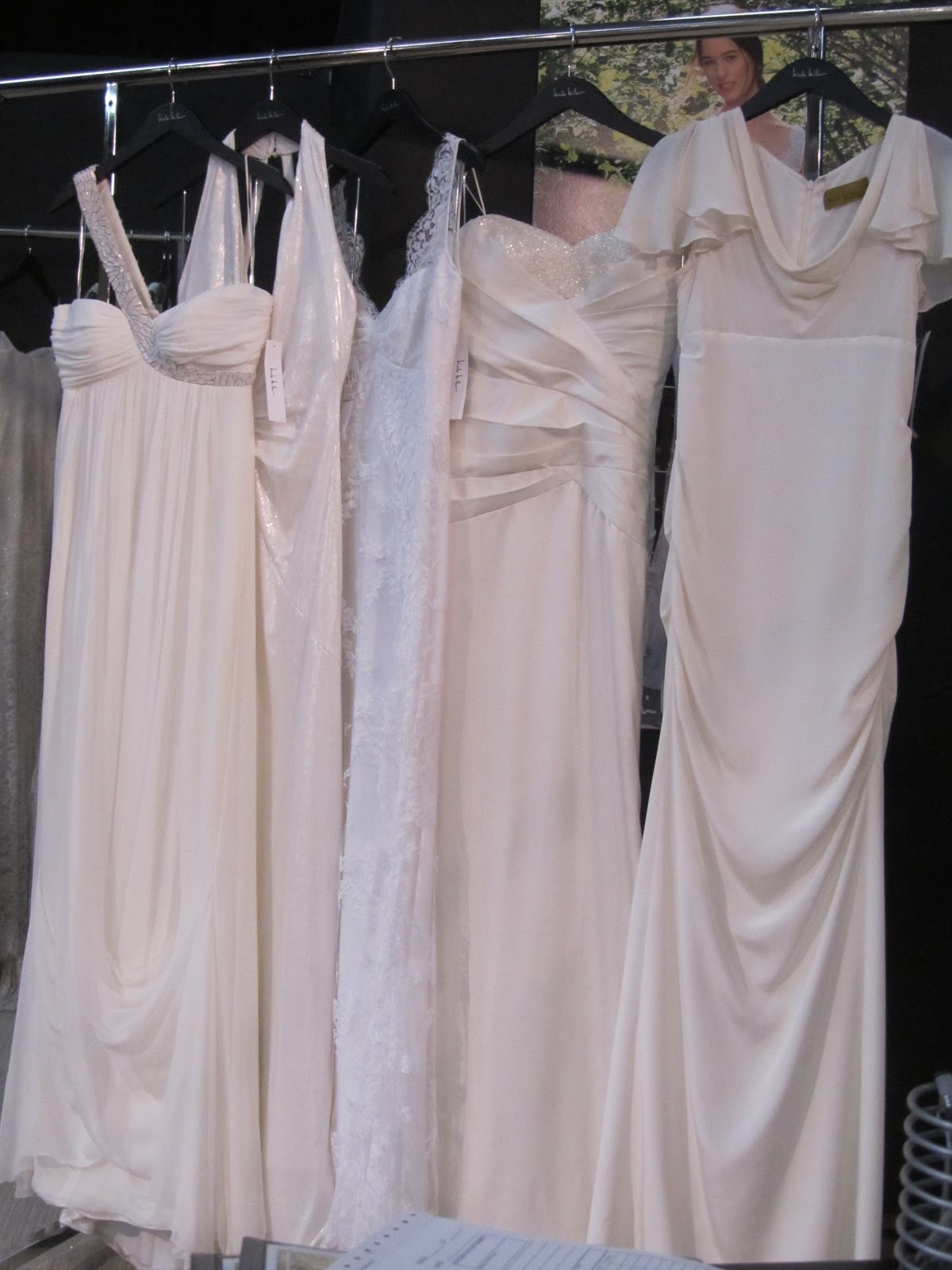 lace wedding dresses with open back and sleeves Great new NM gowns- the Pippa gown on far right is a huge hit!