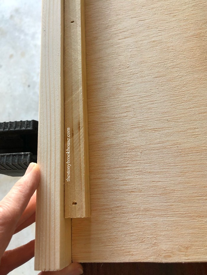 Showing how to attach front 1x2 to shelf