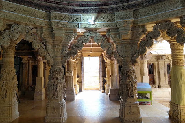 beautifully sculptured toranas inside the temple