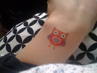 owl tattoos on wrist