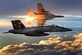 Two F/A-18 Super Hornets in flight