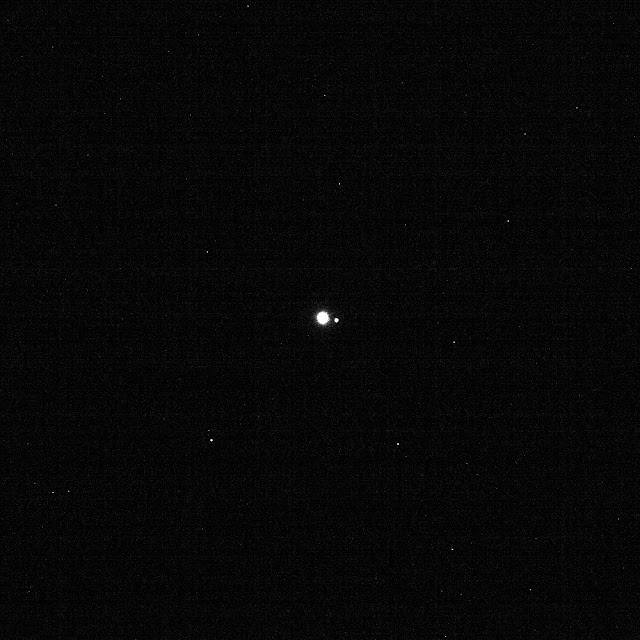 Earth and Moon seen by OSIRIS-REx spacecraft from 63 million kilometers away