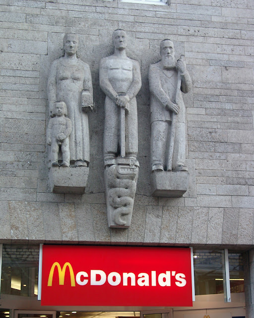 McDonald's sign with statues, Stuttgart