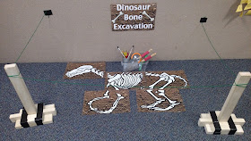 Dinosaur Excavation Sensory Experience | Apples to Applique