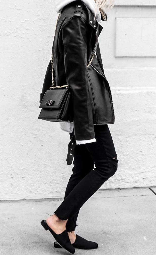 street style inspiration / moto jacket + bag + black skinnies + loafers + sweatshirt