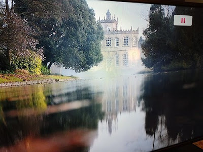 Gothic building, lake, mist