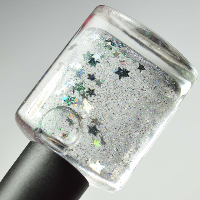 mini nail polish bottle with decorative glitter