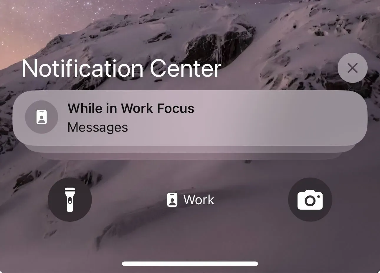 Notification Center in iOS 18 showing a message notification while in Work Focus mode.