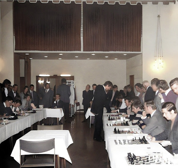 Chess interest was high in Germany during the 1970s. The Siegen Olympiad set a record on visitors. The exhibition attracted numerous spectators.