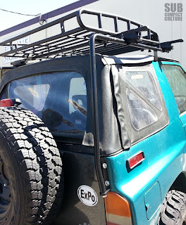 Calmini Roof Rack attaches to factory holes above the taillights.