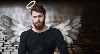 man in a black t shirt with wings and a halo