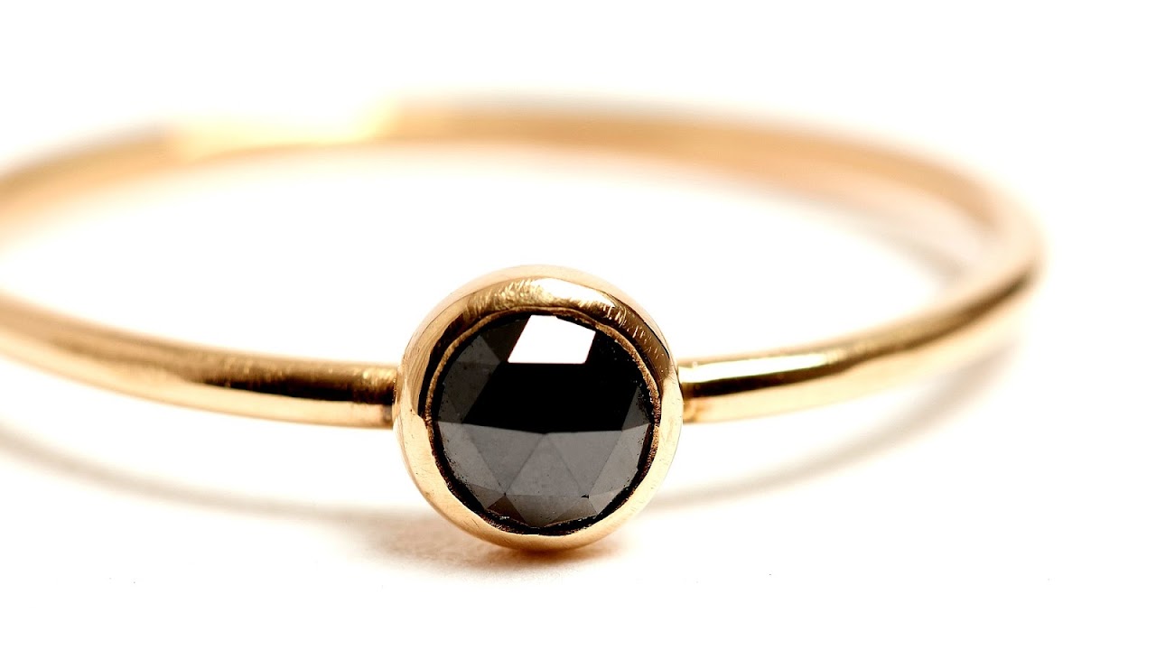 Black Diamond And Yellow Gold Rings