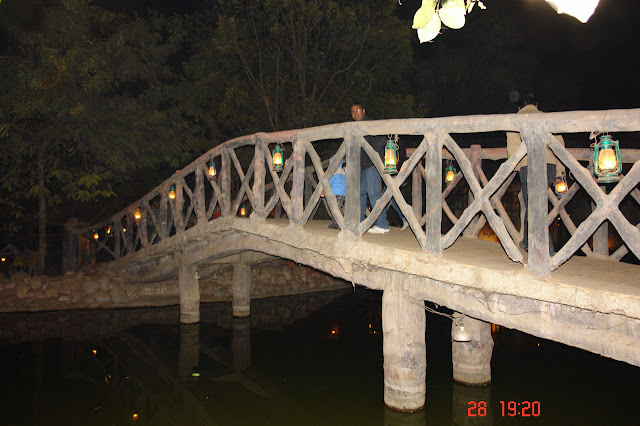 Photo of Small bridge over a stream inside the tourist village of Chokhi Dhani