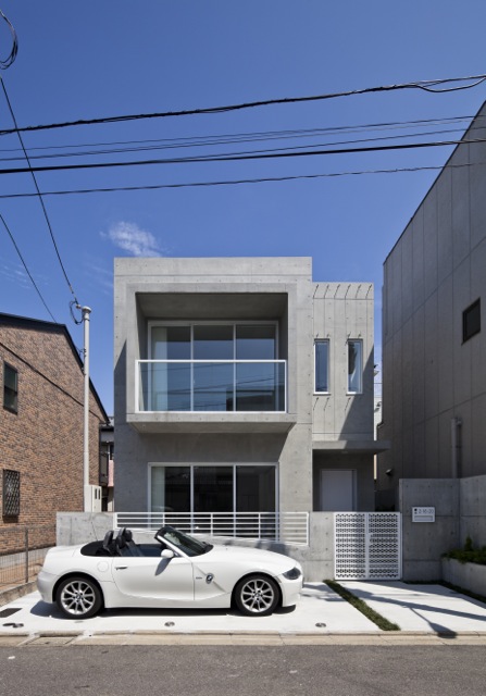 Photo of small modern minimalist home as seen from the street