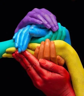 coloured hands holding each other