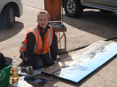 Industrial heritage artist Jane Bennett  painting the ex HMAS Adelaide en plein air on Glebe Island Wharf