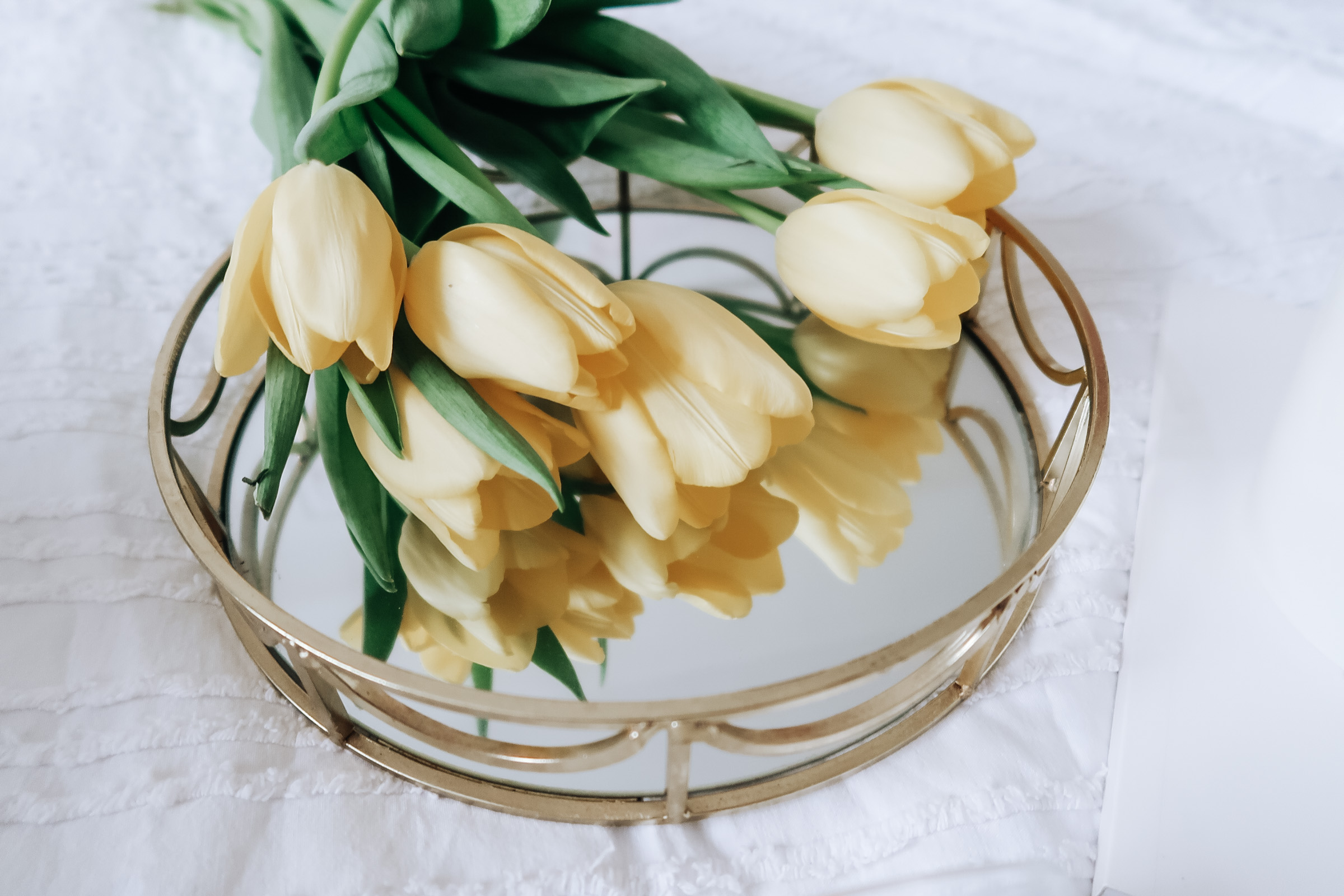 A bouquet of yellow tulips.