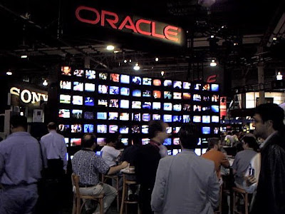 Wall of TVs at Oracle's NAB '99 booth