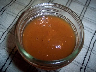 Jar of spiced peach butter.