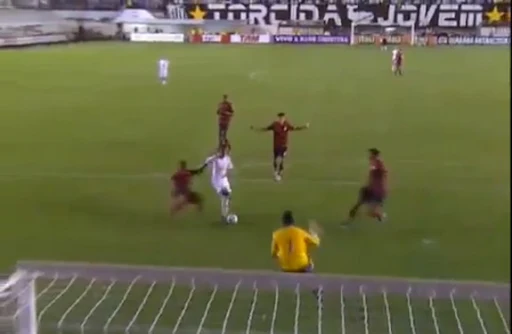 Santos striker Neymar shoots to score a goal against Flamengo