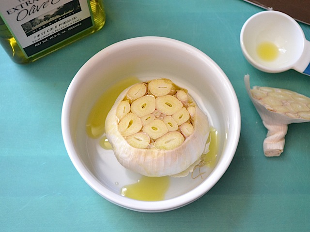 drizzle garlic with oil