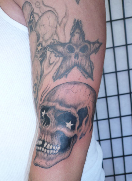 The next tattoo was a free hand design keeping it simple with just skulls