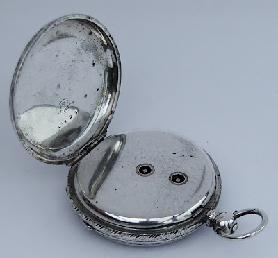 Lovely antique hand chased fine silver silver fob pocket watch